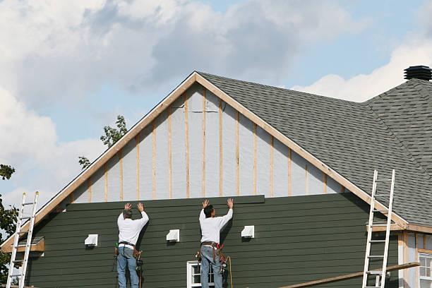 Professional Siding Replacement technician working in East Boston, MA